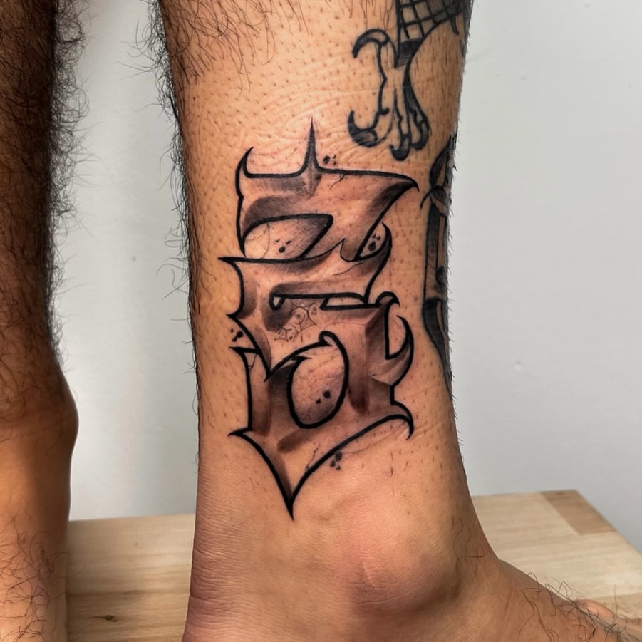 Black ink calligraphy work by Groc, tattoo artist in Tel Aviv