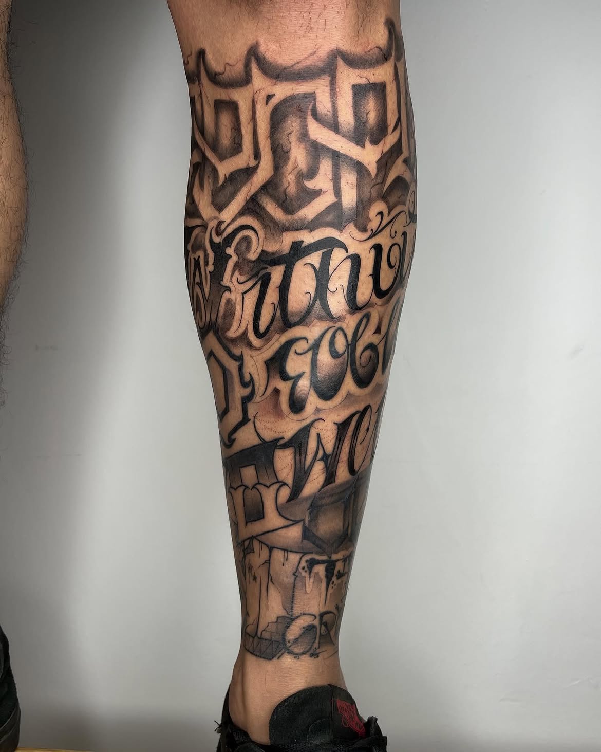 Script calligraphy tattoo by Groc at Sage Tattoo Studio Tel Aviv