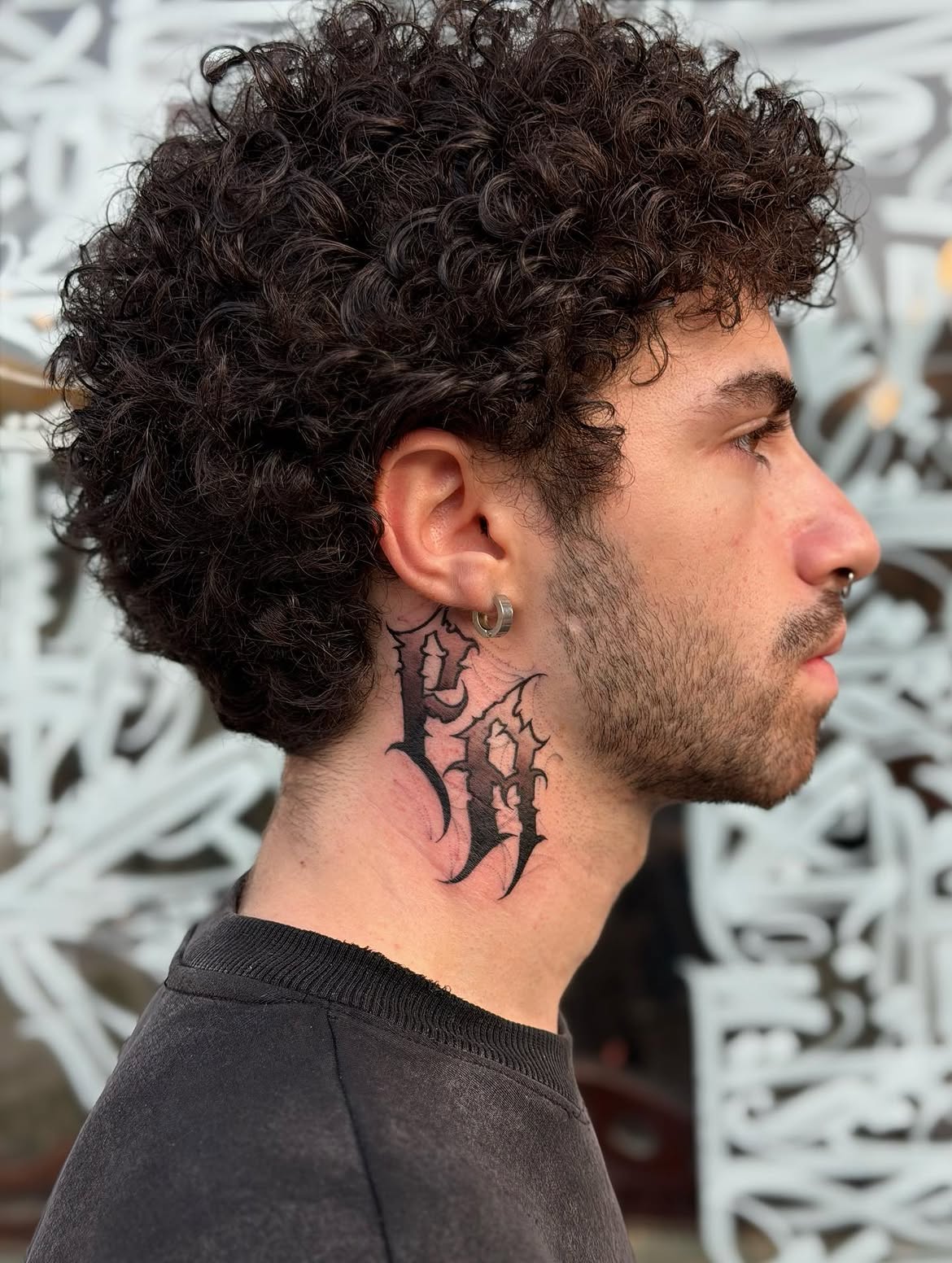Flowing script tattoo by Groc, tattoo artist in Tel Aviv