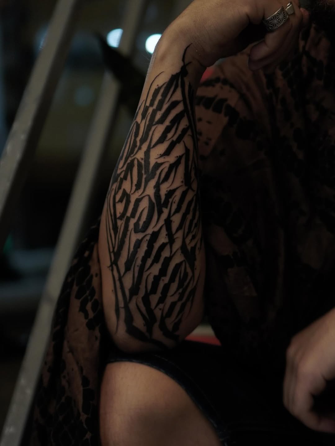 Blackwork calligraphy tattoo by Sean Misiuk — tattoo tel aviv