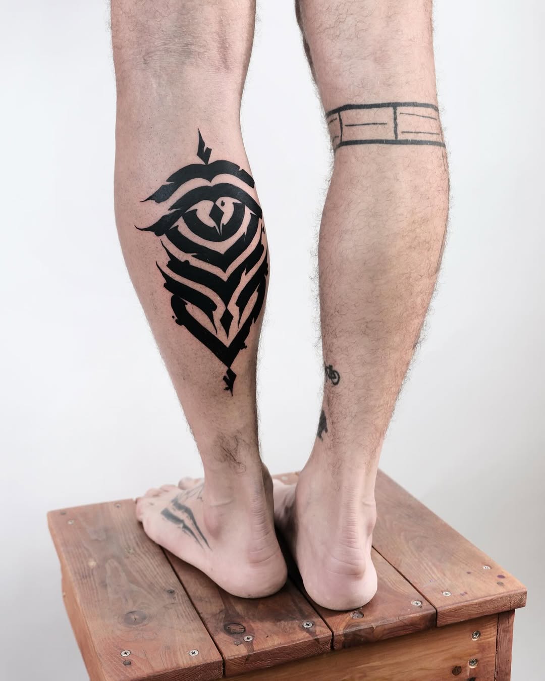 Calligraphy blackwork tattoo by Sean Misiuk — tattoo in Tel Aviv